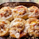 Peach Cobbler Cinnamon Rolls with Crumb Topping