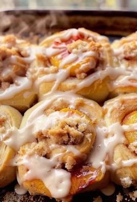 Peach Cobbler Cinnamon Rolls with Crumb Topping
